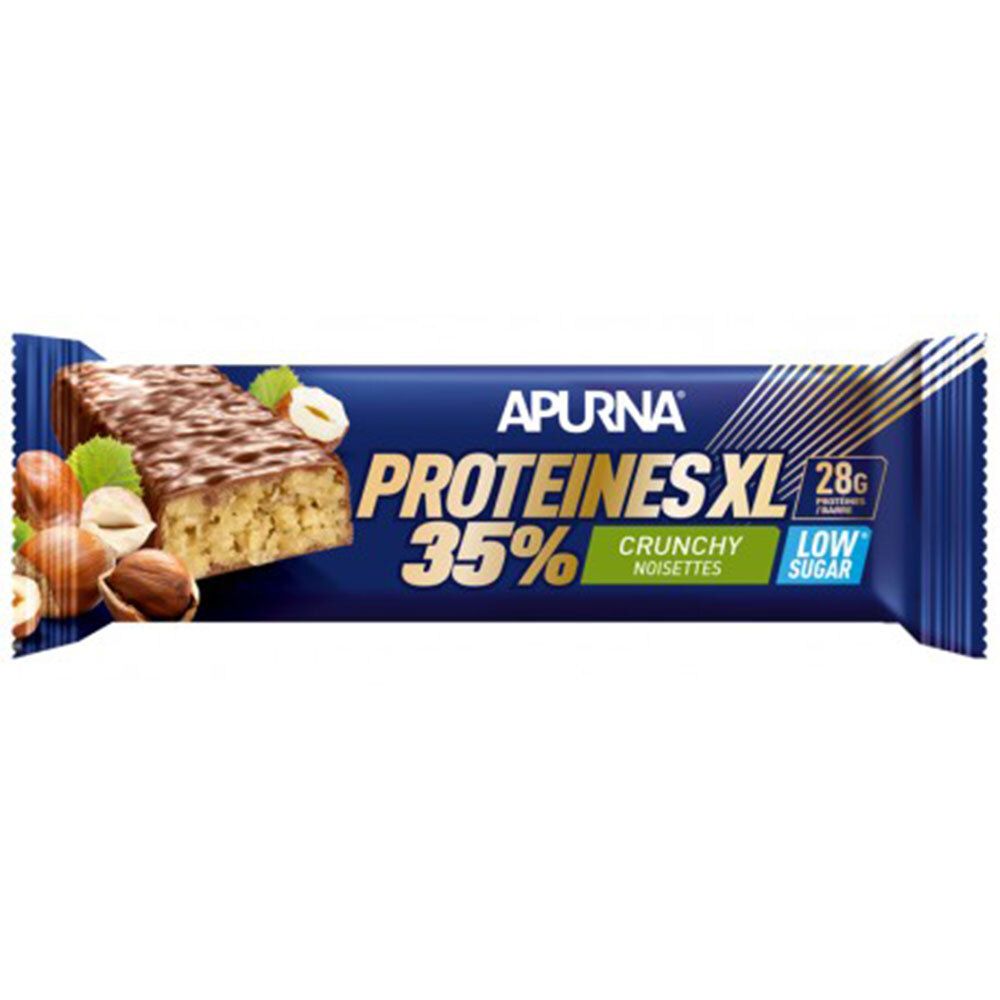Barre protéinée APURNA PROTEINES XL, 35% protéines, Crunchy Noisettes, Low Sugar. Emballage bleu. Morceau de barre et noisettes.