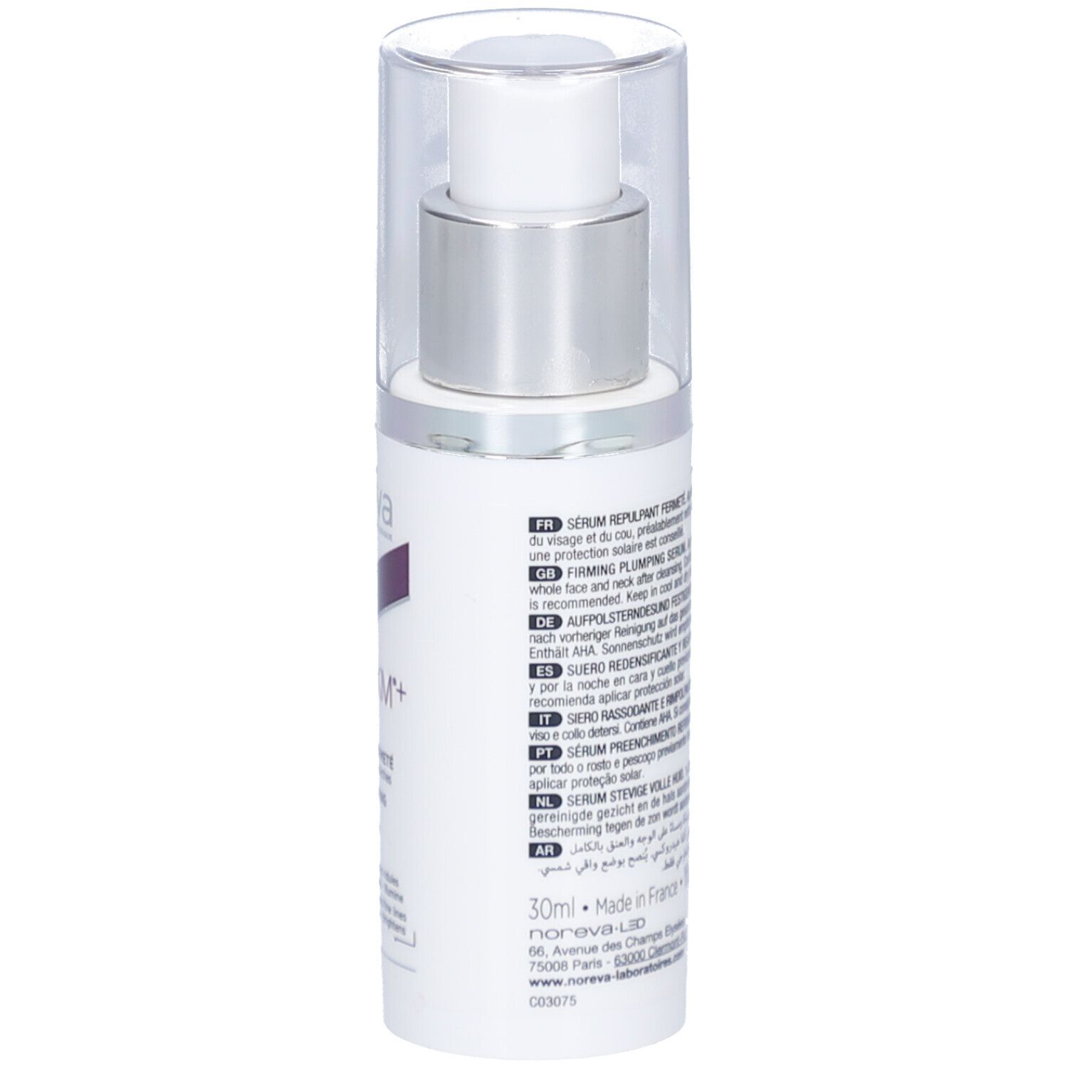 Flacon blanc avec pompe argentée et bouchon transparent. Texte visible.