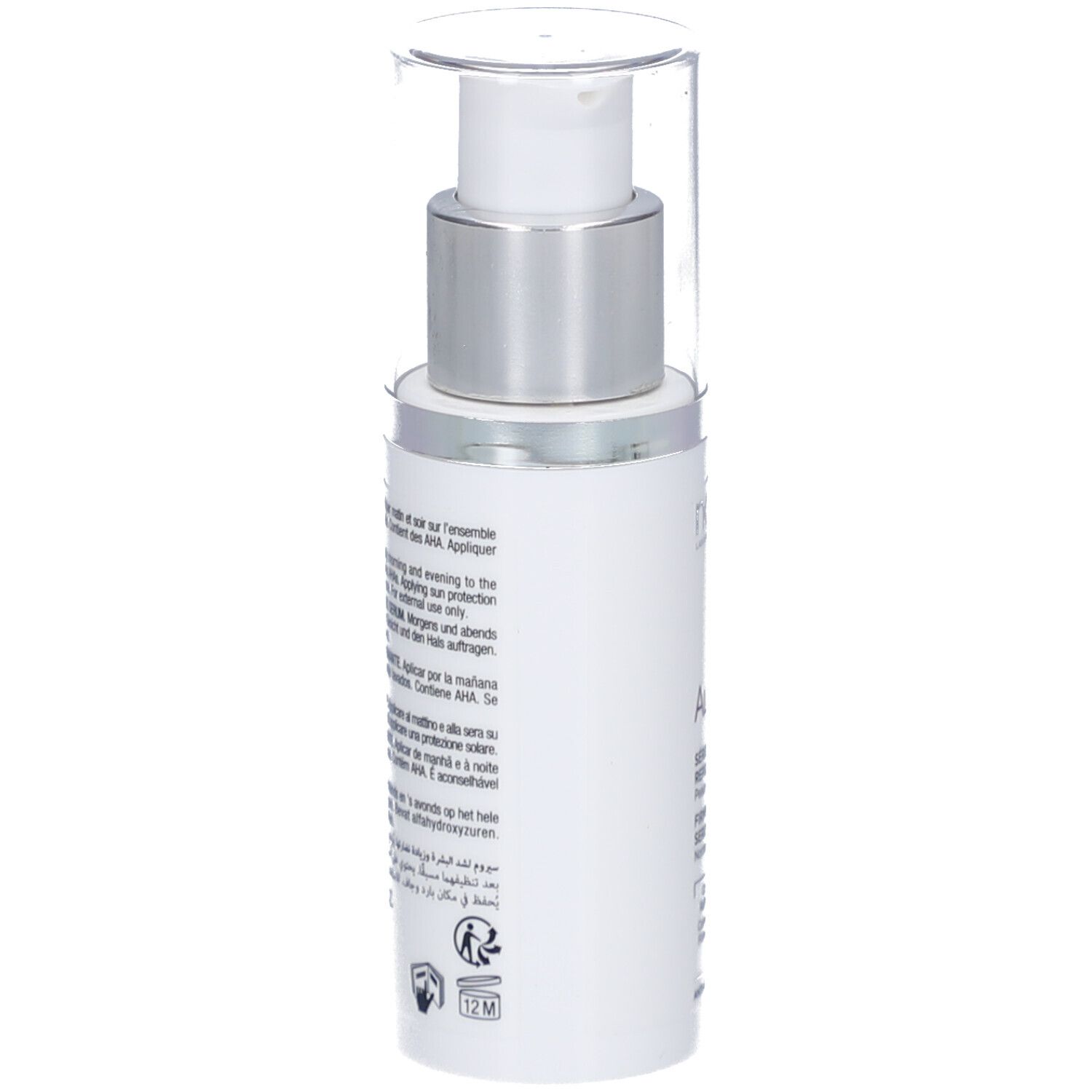 Flacon blanc avec pompe argentée et bouchon transparent. Texte visible.