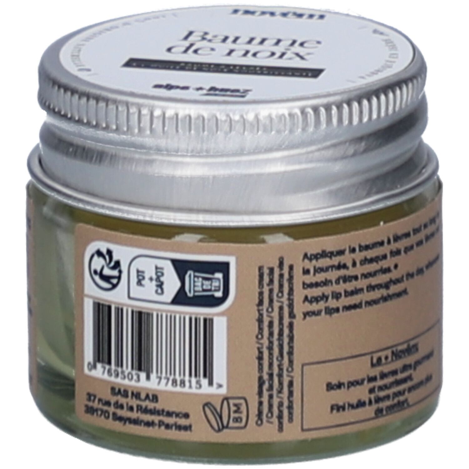 Pot en verre avec couvercle argenté. Étiquette avec code-barres, adresse et texte: Creme visage confort/Comfort face cream. Pot Capot.