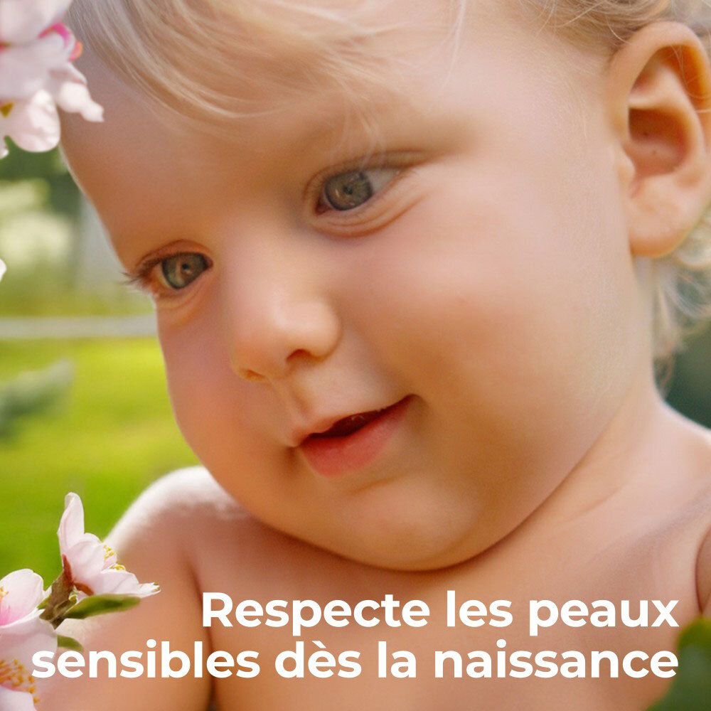 Visage de bébé. Texte : Respecte les peaux sensibles dès la naissance.