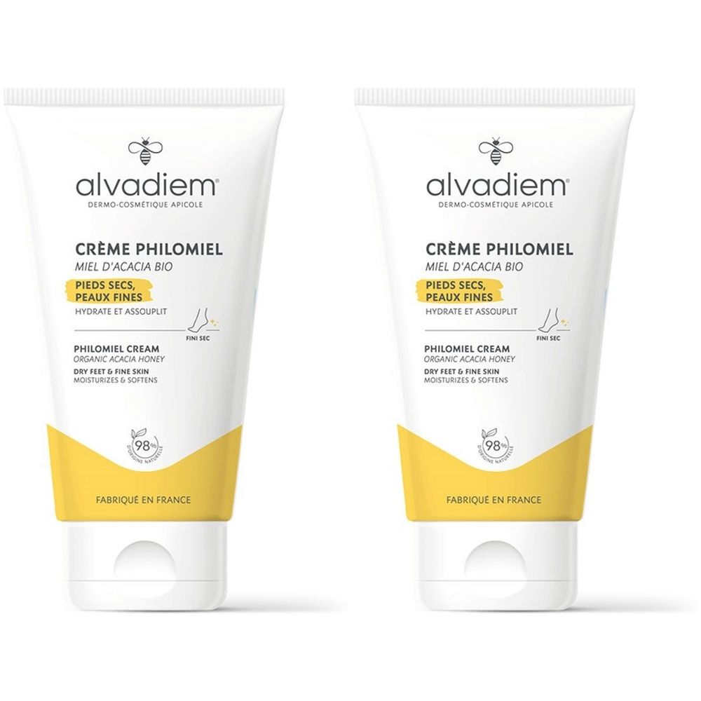 Deux tubes de crème pour pieds Alvadiem Philomiel au miel pour peaux sèches. Tubes blancs avec accents jaunes et logo abeille.