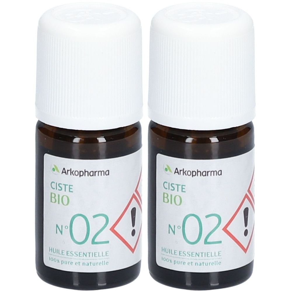 Deux flacons en verre brun avec bouchons blancs. Étiquettes : "Arkopharma Ciste BIO N°02". Symbole d'avertissement.