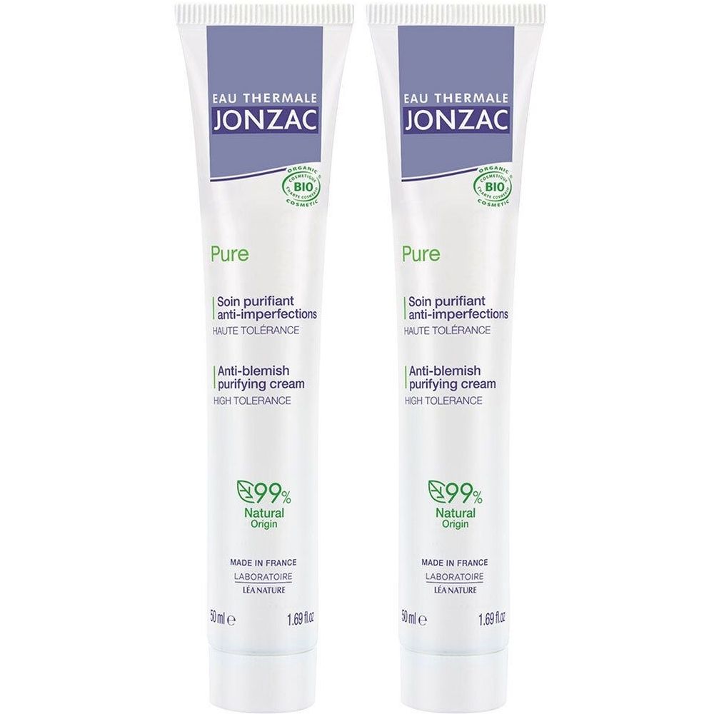 Deux tubes de crème Jonzac Pure. Tubes blancs avec texte bleu. Texte: Eau Thermale Jonzac, Pure, anti-imperfections, 99% d'origine naturelle.