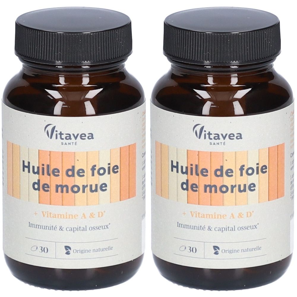Deux flacons en verre brun avec bouchons noirs. Étiquettes avec "Huile de foie de morue" et "Vitamine A & D".