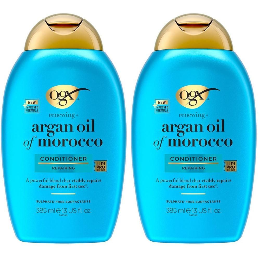Deux flacons bleus avec bouchons dorés. Inscription : "ogx renewing+ argan oil of morocco CONDITIONER".