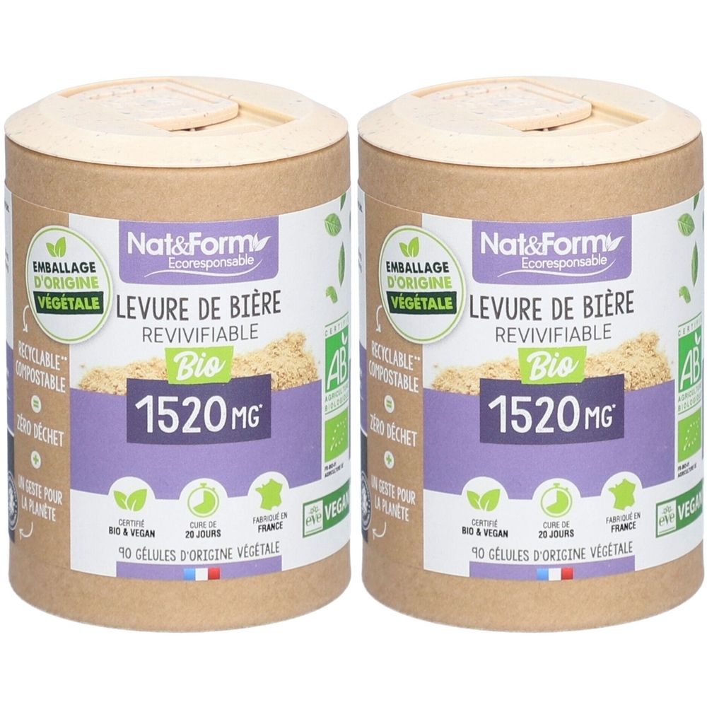 Deux boîtes cylindriques. Étiquettes: Nat&Form Levure de bière Bio revivifiable, 1520 MG, 90 gélules. Emballage d'origine végétale.