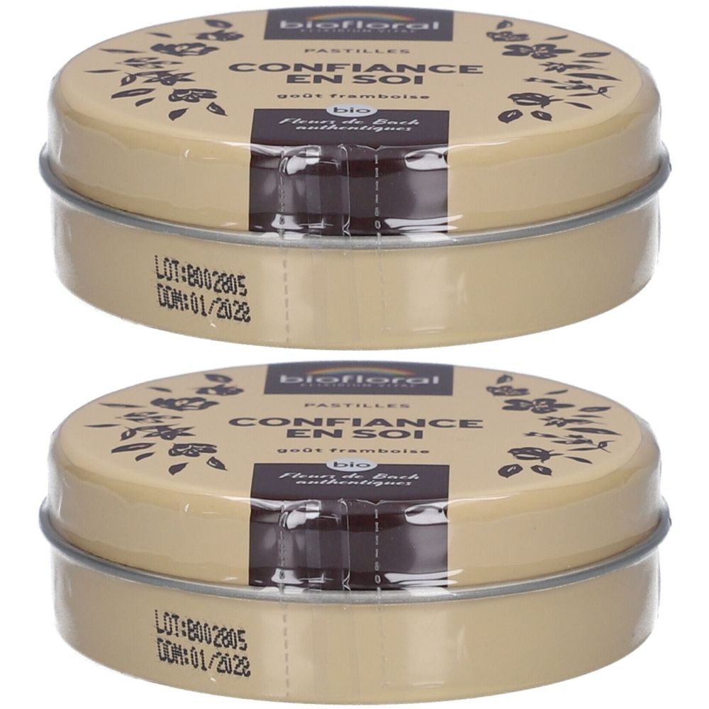 Deux boîtes rondes beiges avec couvercles. Inscription : BIOFLORAL Confiance En Soi. Impression de fleurs et texte. DDM 01/2022.