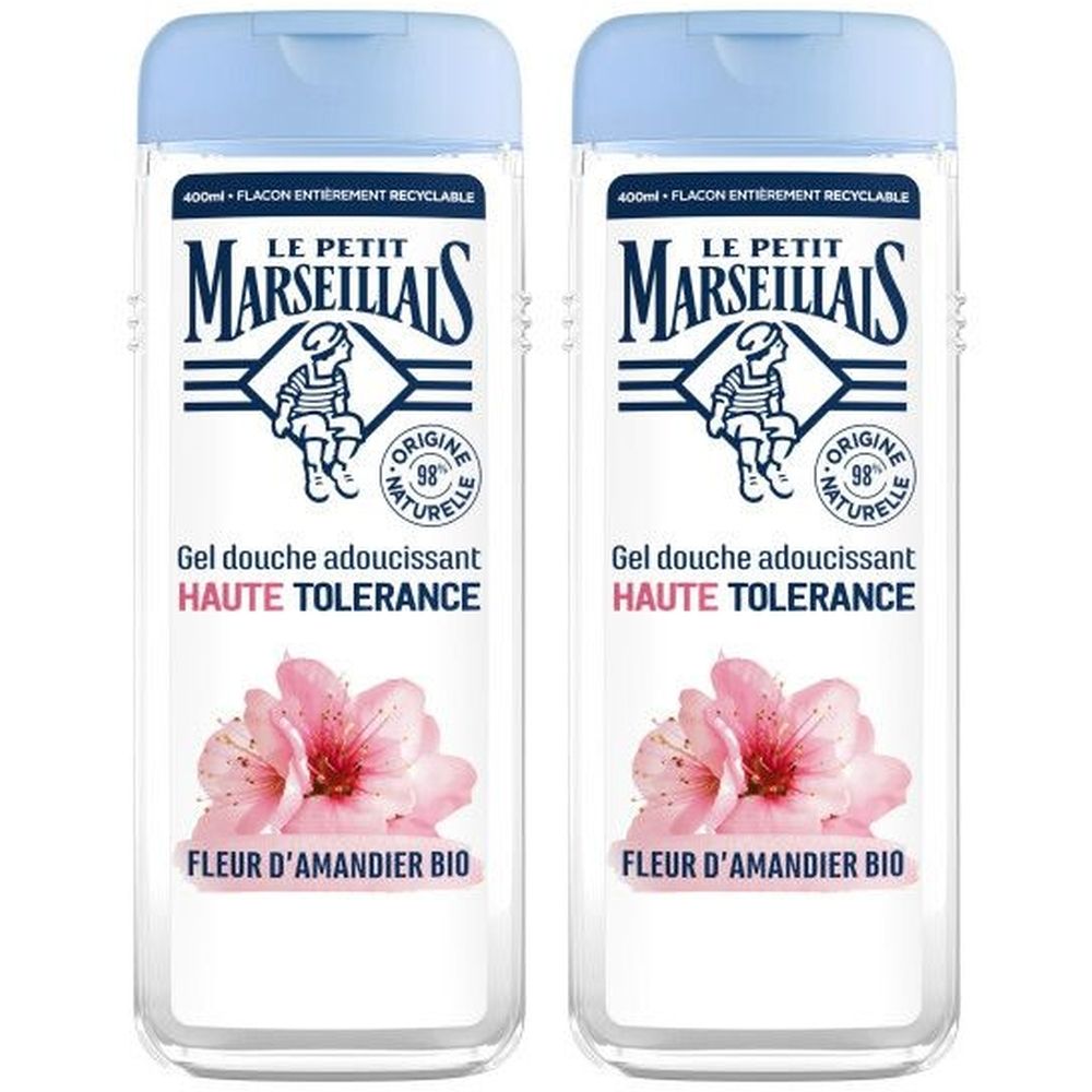 Deux flacons transparents avec bouchon bleu. Inscription: Le Petit Marseillais, Gel douche adoucissant, Haute Tolérance, Fleur d'Amandier Bio.