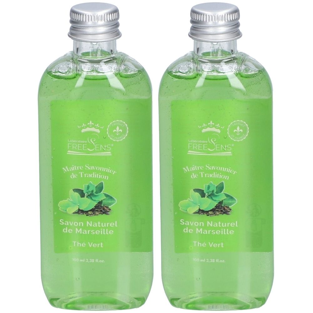 Deux bouteilles de savon liquide vert avec motif de menthe et de feuilles de thé.