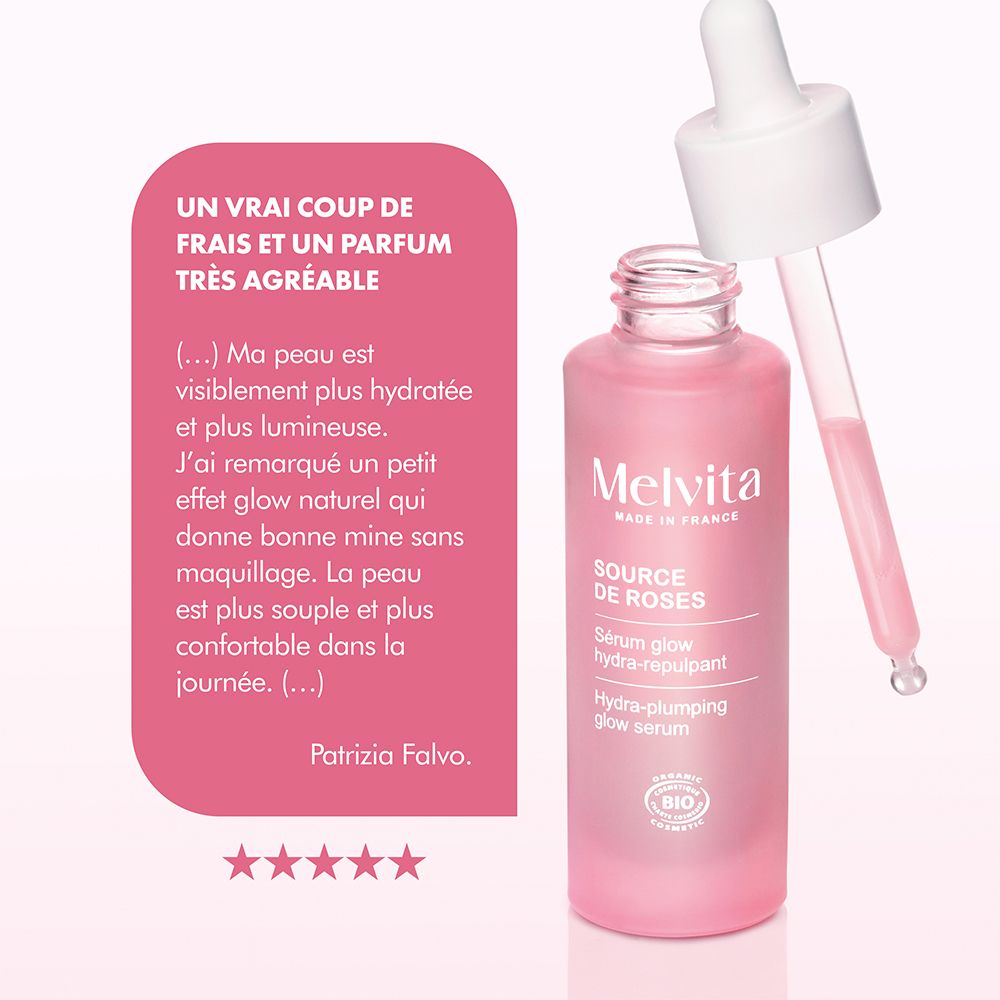 Flacon rose avec pipette. Texte et étoiles. Citation : peau visiblement hydratée.