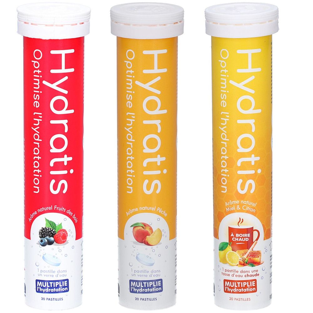 Trois tubes cylindriques de pastilles Hydratis. Inscription : Optimise l'hydratation. Arômes : Fruits des bois, Pêche, Miel & Citron. Bouchons blancs.