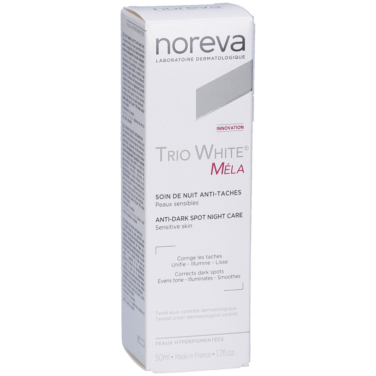Boîte blanche. Inscription: Trio White Mela, soin de nuit anti-taches. Marque: Noreva.