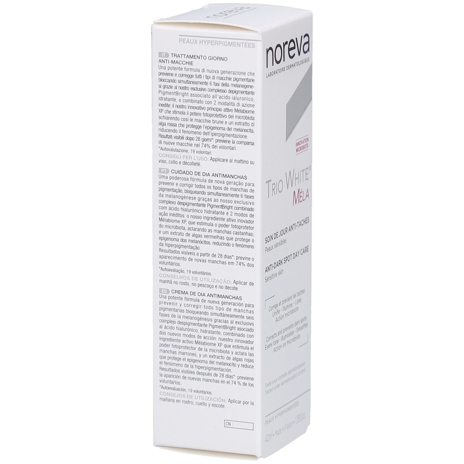 Vue latérale de la boîte Noreva Trio White Méla. Textes en italien et espagnol. Informations sur le produit.