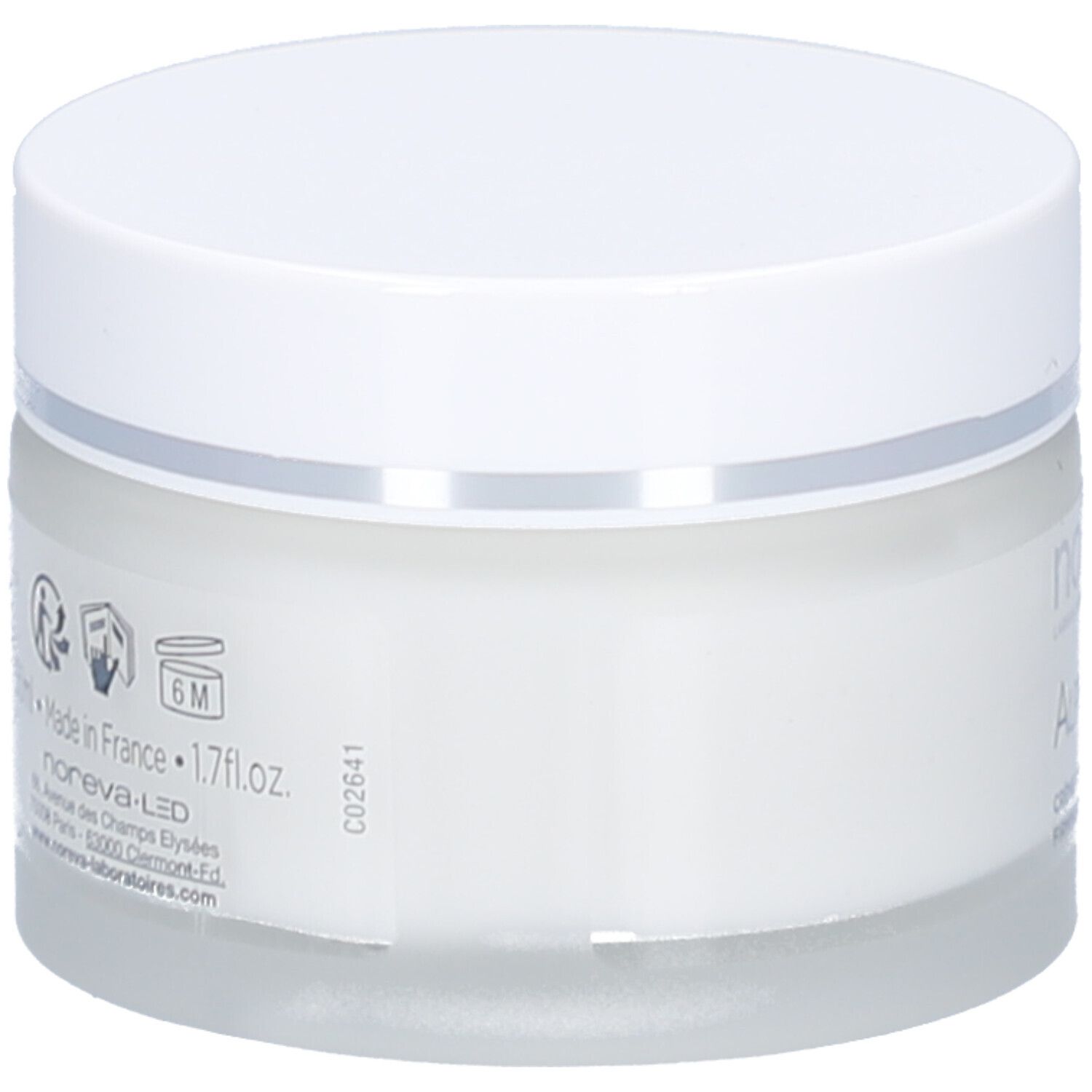 Pot de crème, vue latérale. Couvercle blanc, bord argenté. Inscription: 1.7 fl.oz., 5M. Fabriqué en France.