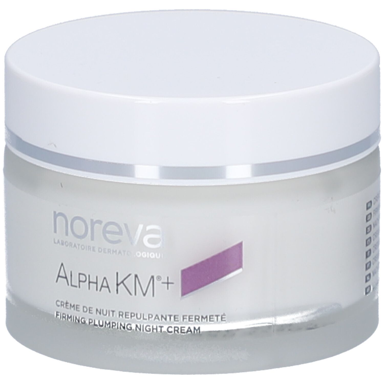 Pot de crème avec couvercle blanc. Inscription: Noreva, Alpha KM+, Crème de nuit repulpante fermeté. Accent violet.
