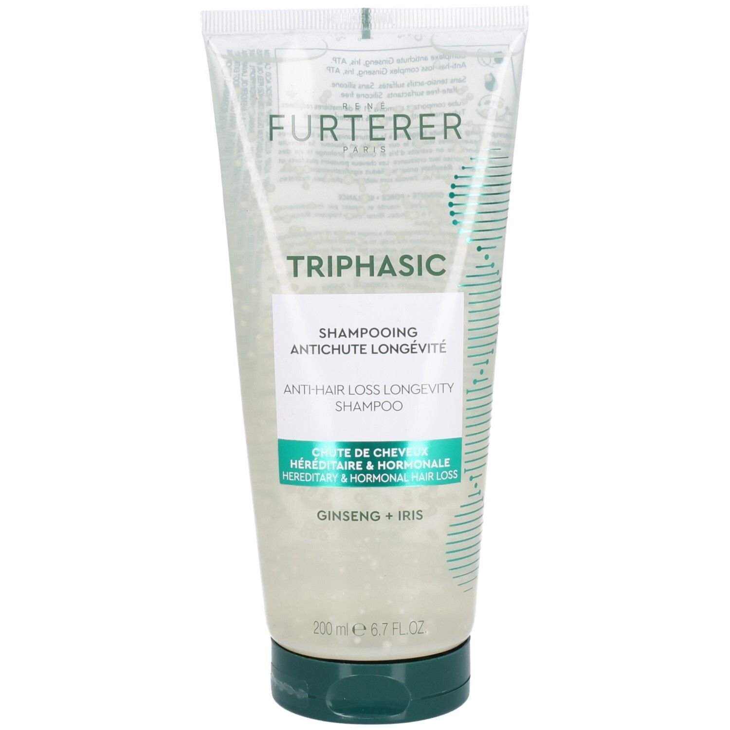 Tube transparente, bouchon vert. Inscription: TRIPHASIC, SHAMPOING ANTICHUTE LONGÉVITÉ. Texte: ANTI-HAIR LOSS LONGEVITY SHAMPOO.