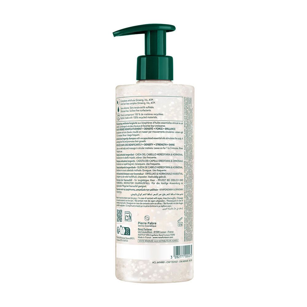 Dos du flacon de shampooing. Texte et informations sur le produit imprimés. Flacon transparent.