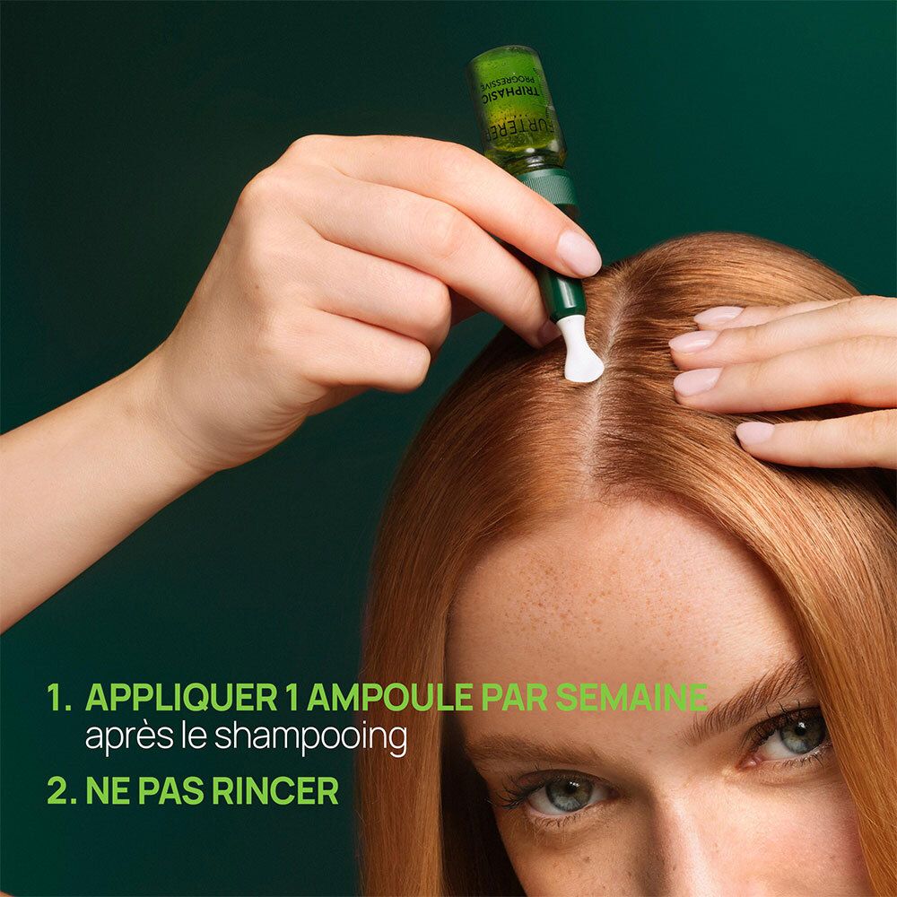 Personne aux cheveux roux appliquant une ampoule sur le cuir chevelu. Texte.