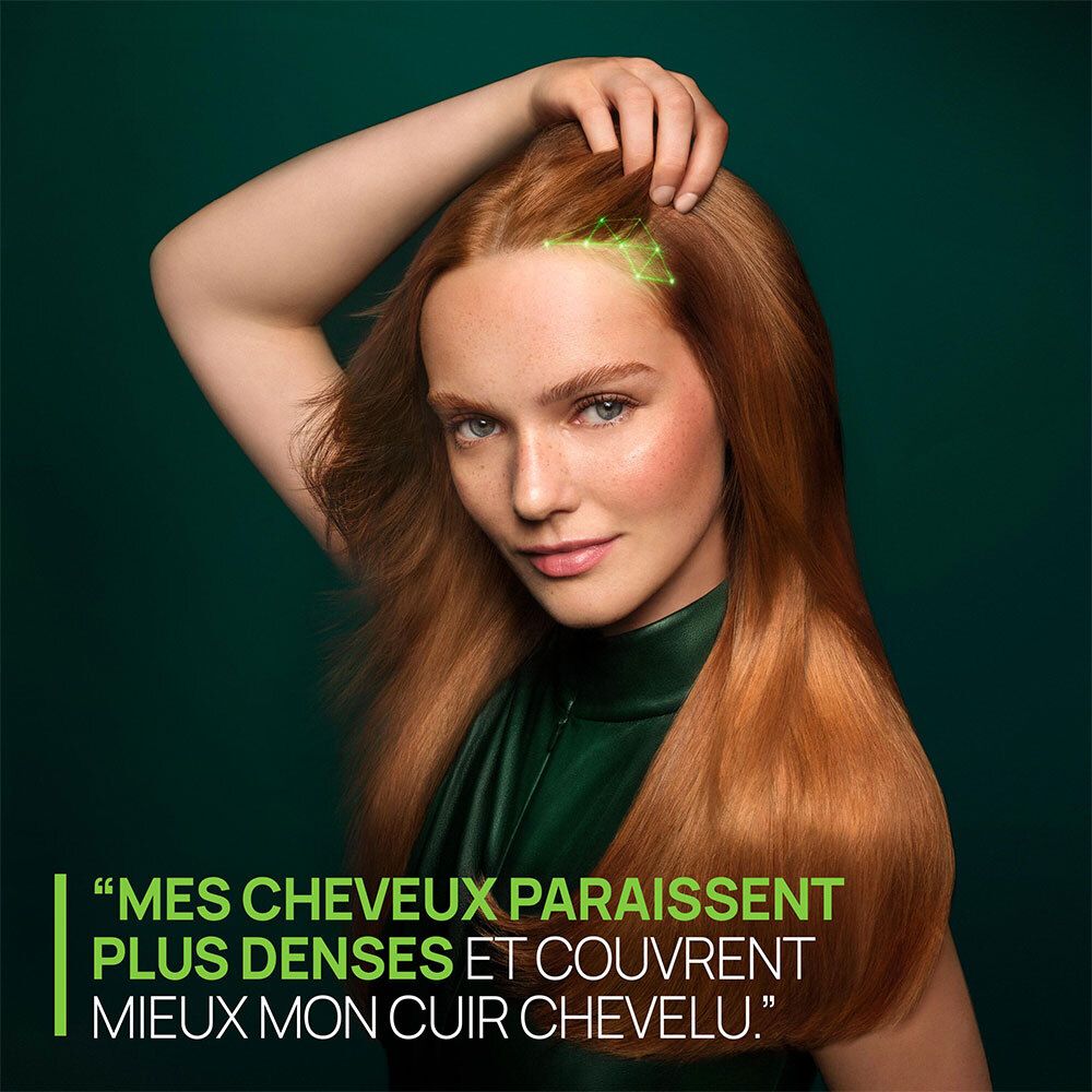 Femme aux cheveux roux. Texte: Mes cheveux paraissent plus denses.