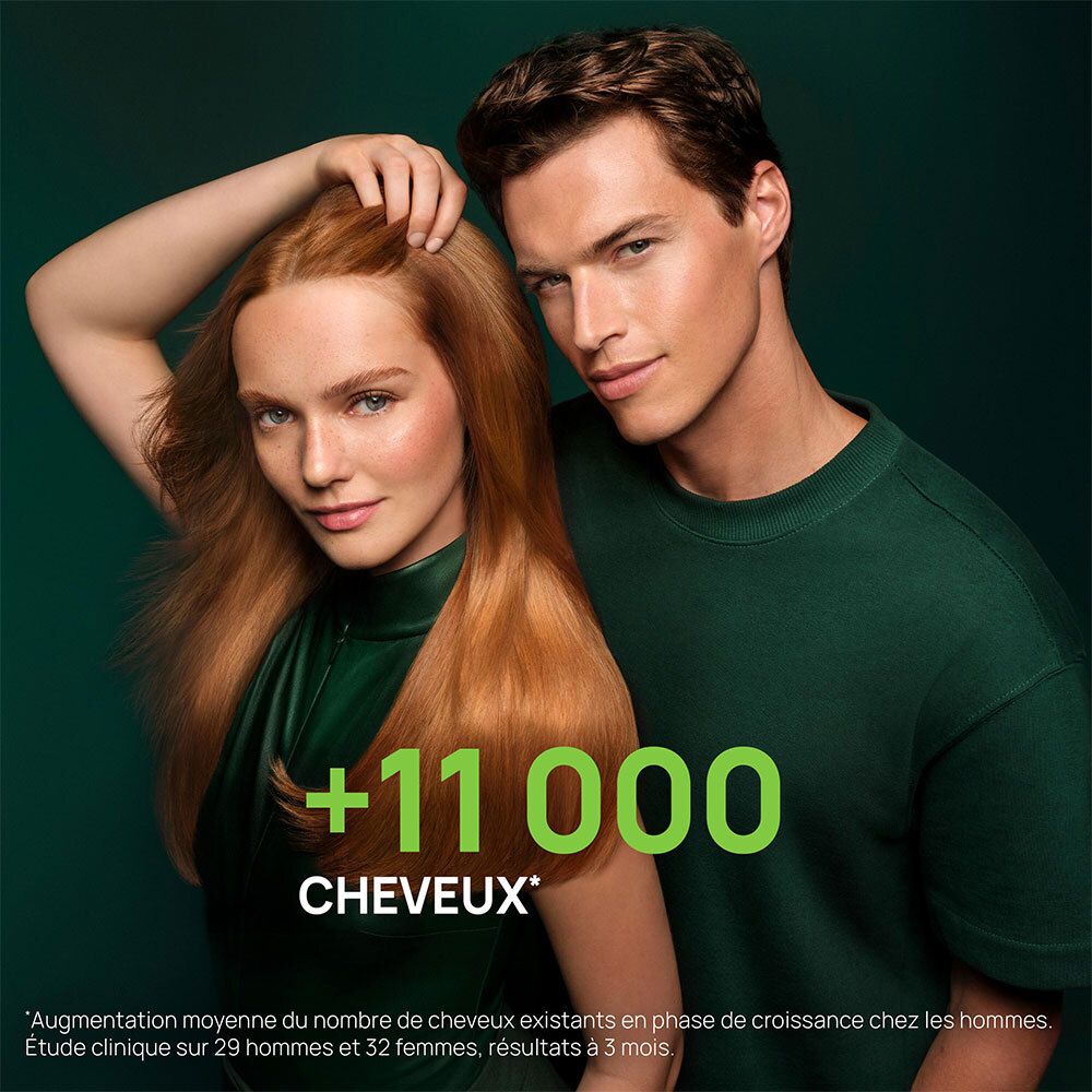 Couple. Femme aux cheveux roux. Texte: +11 000 CHEVEUX.