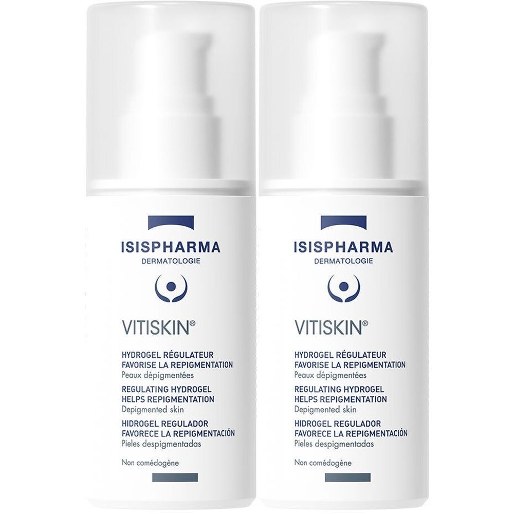 Deux flacons de Vitiskin ISISPHARMA. Flacons blancs avec pompe et texte bleu. Texte: Hydrogel régulateur favorisant la repigmentation.