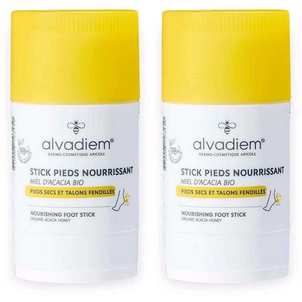 Deux sticks blancs avec bouchons jaunes. Inscription: alvadiem, Stick Pieds Nourrissant, Miel d'Acacia Bio. Pour pieds secs et talons fendillés.