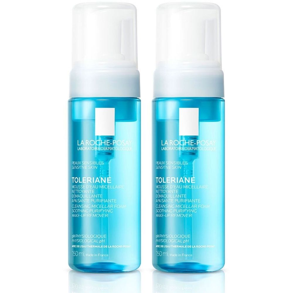 Deux flacons de LA ROCHE-POSAY Toleriane Mousse d'Eau Micellaire. Flacons bleus avec pompe blanche. Texte: Toleriane, Mousse Micellaire.