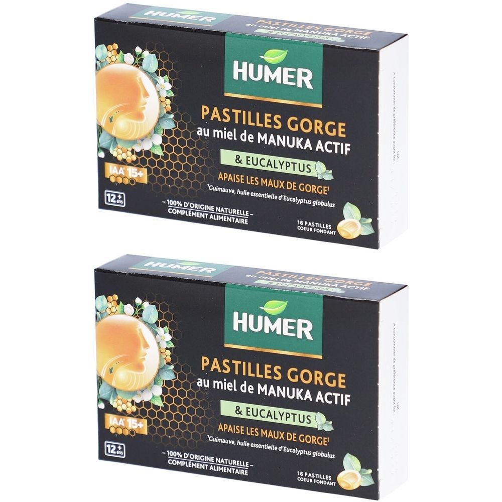 Deux boîtes de Pastilles Gorge HUMER. Emballage noir avec des accents verts et blancs. Texte : Pastilles Gorge, au miel de Manuka actif.