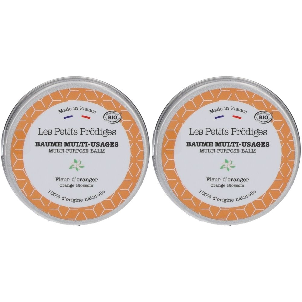 Deux boîtes rondes avec couvercles. Inscription: Les Petits Prödiges, BAUME MULTI-USAGES, Fleur d'oranger. Label bio et « Made in France ».