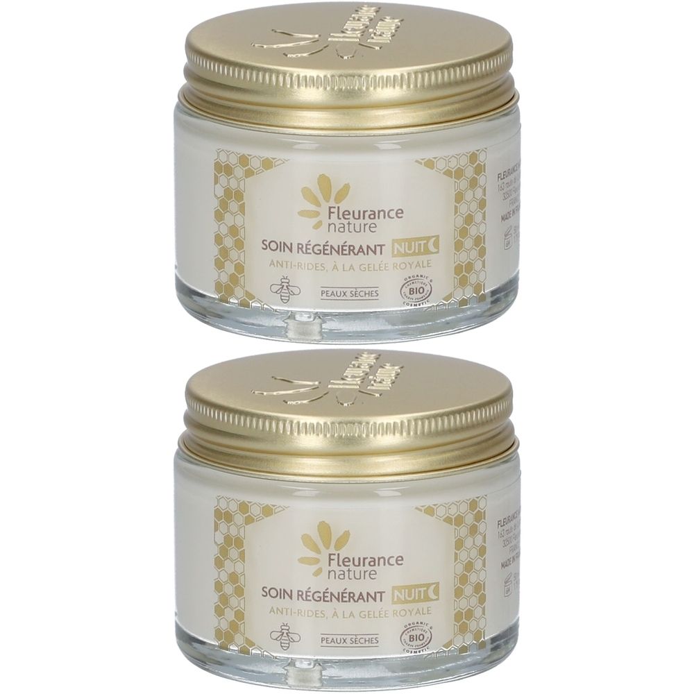 Deux pots en verre avec couvercles dorés. Étiquettes avec "Fleurance nature SOIN RÉGÉNÉRANT NUIT". Certification bio.