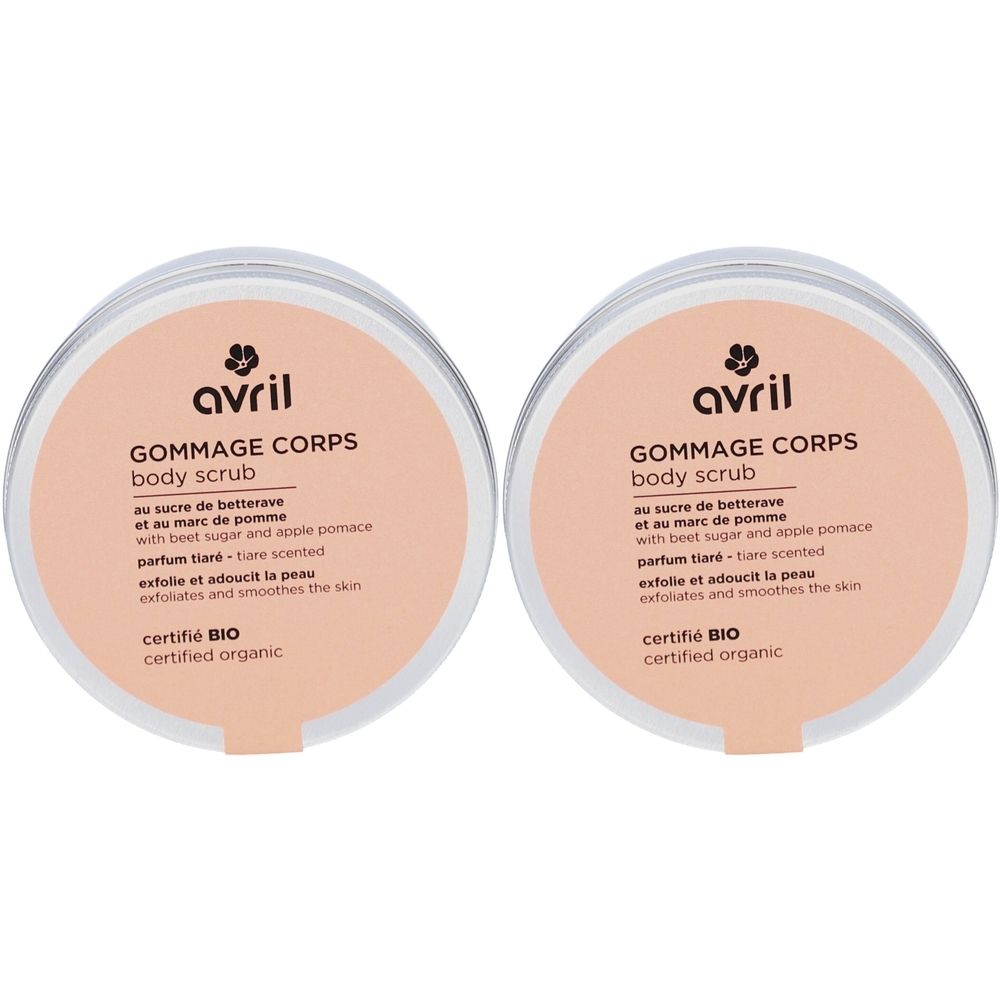 Deux pots ronds avec couvercles roses. Inscription: avril, Gommage Corps, certifié BIO. Texte: au sucre de betterave, parfum tiaré, exfolie et adoucit la peau.