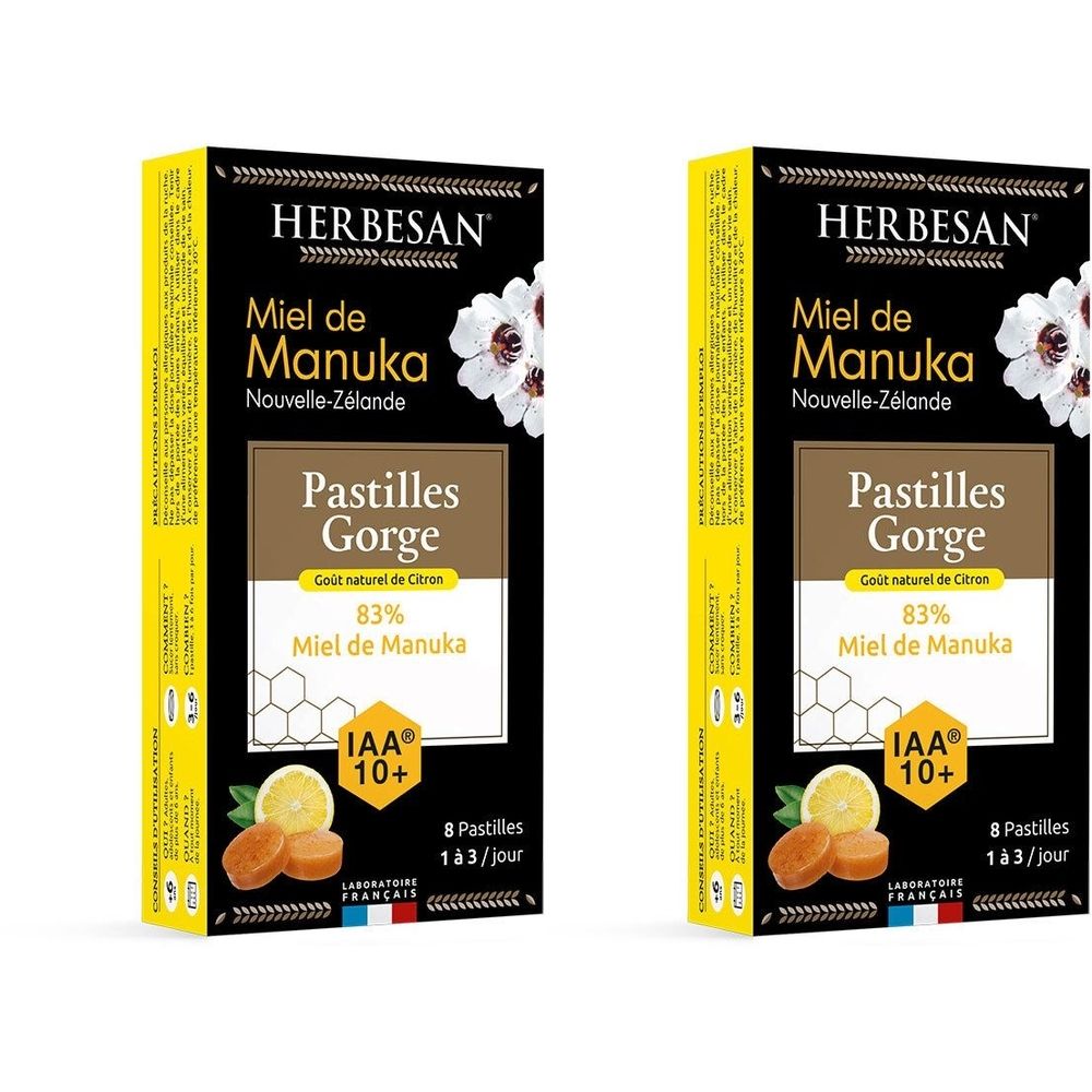 Deux boîtes de Pastilles Gorge Herbesan. Emballage noir et jaune. Texte : Miel de Manuka, IAA 10+. 8 pastilles.
