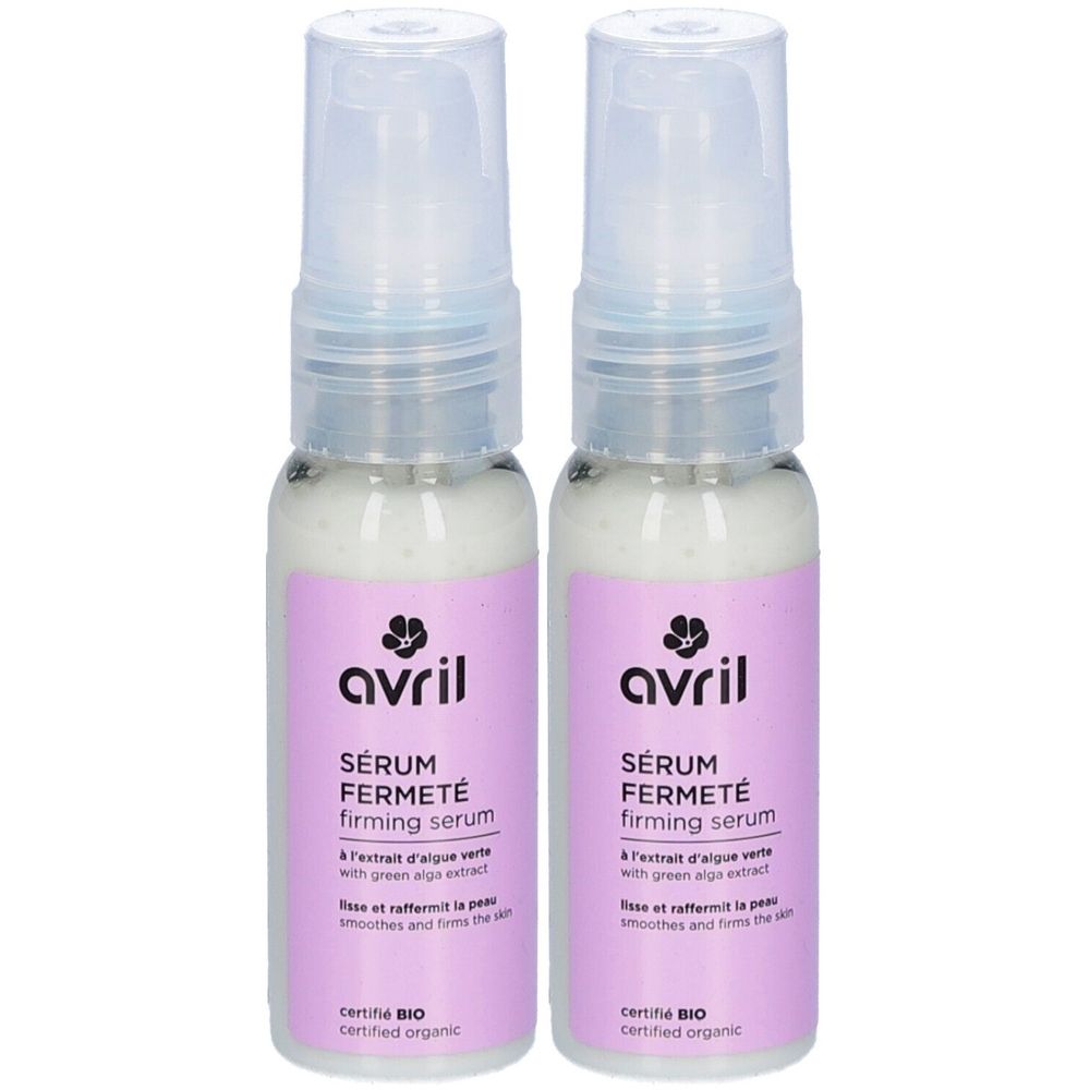 Deux flacons de sérum fermeté AVRIL. Chaque flacon porte une étiquette violette avec du texte et le logo. Produit certifié bio.