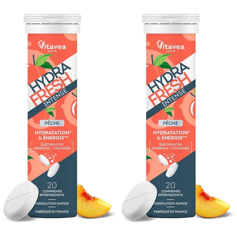 Deux tubes de VITAVEA HydraFresh Intense Pêche. Inscription : Hydra Fresh Intense, Pêche, 20 comprimés effervescents. Avec morceau de pêche et comprimé.