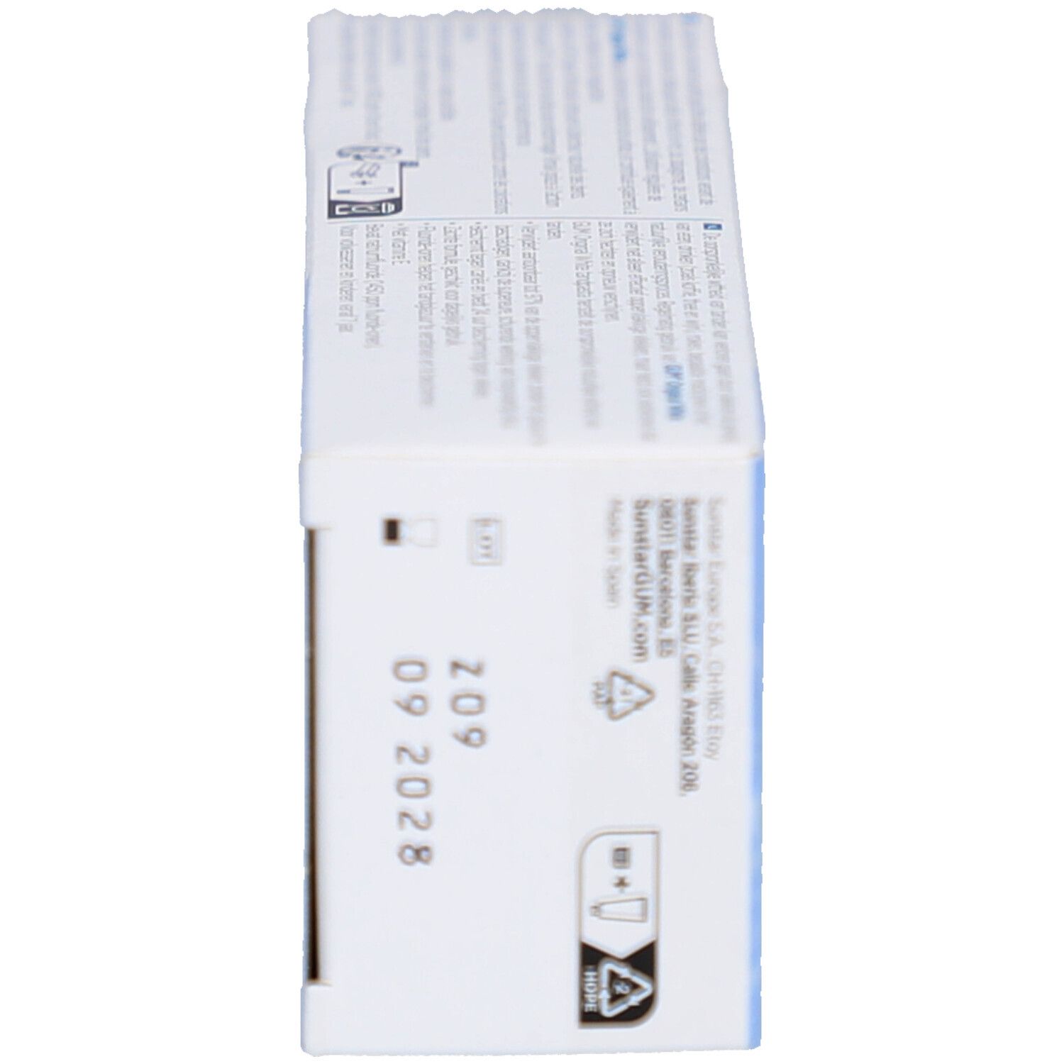 Vue latérale de la boîte GUM Original White. Texte, logos et date d'expiration 09 2028.