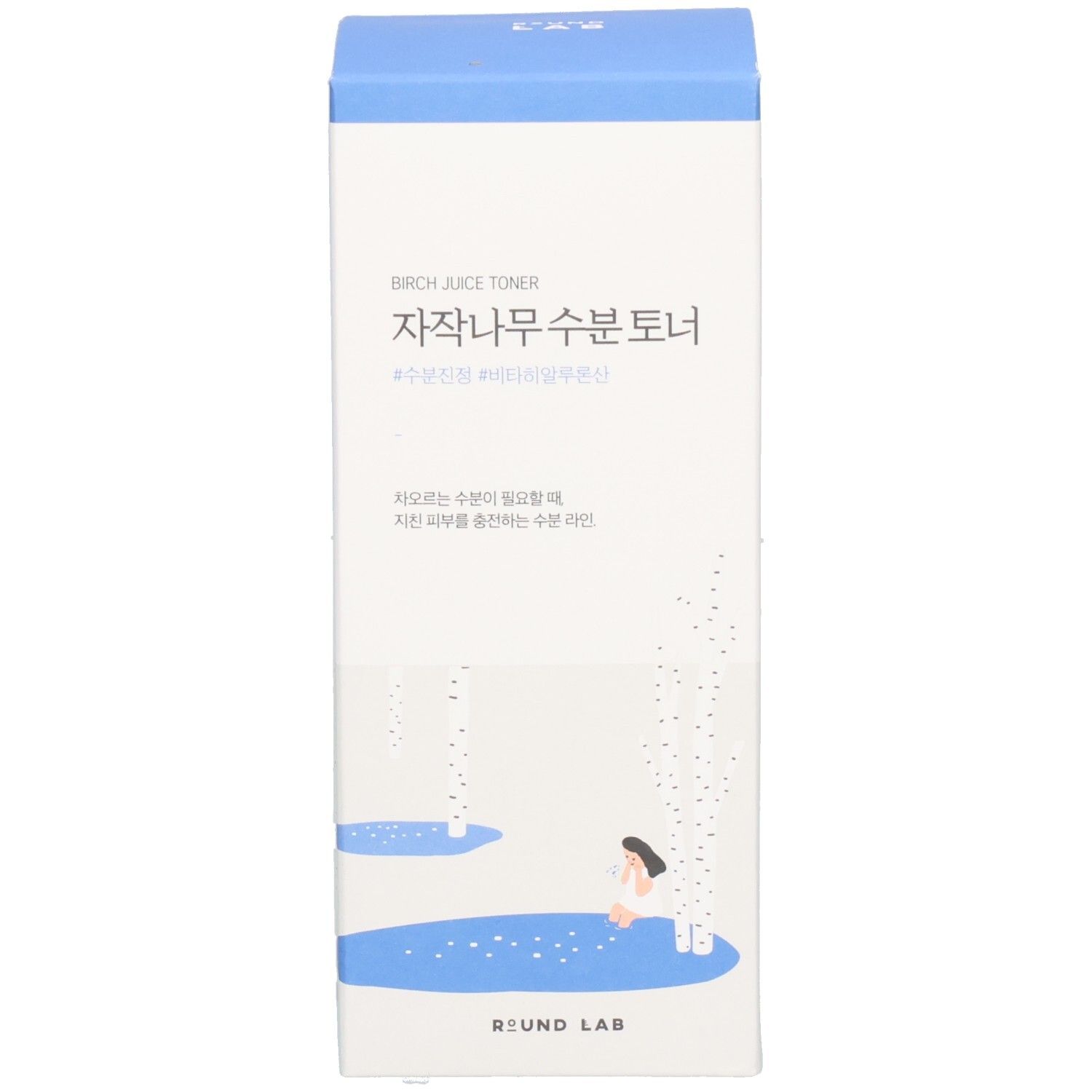 Emballage du produit avec boîte. Boîte bleue avec texte blanc. Inscriptions coréennes.