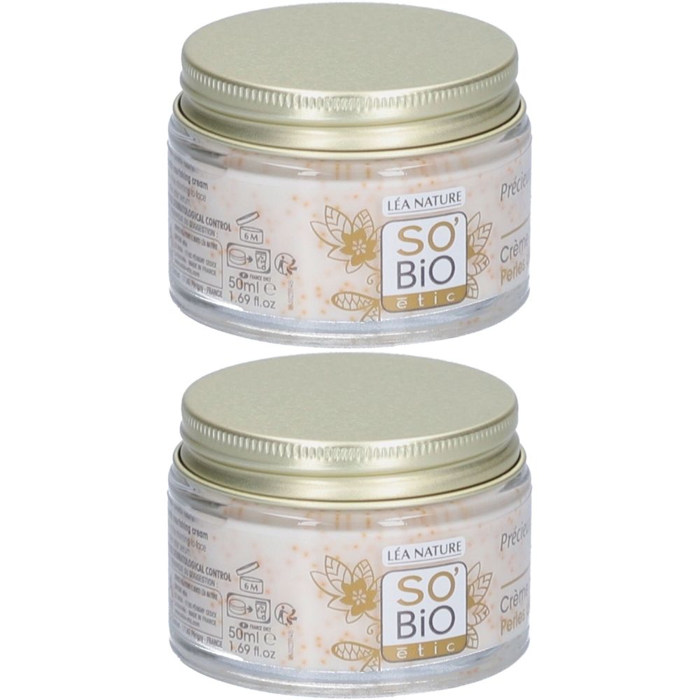 Deux pots de SO BIO ETIC Precious Argan Crème Nutritive Perles d'Argan avec bouchons à vis dorés.