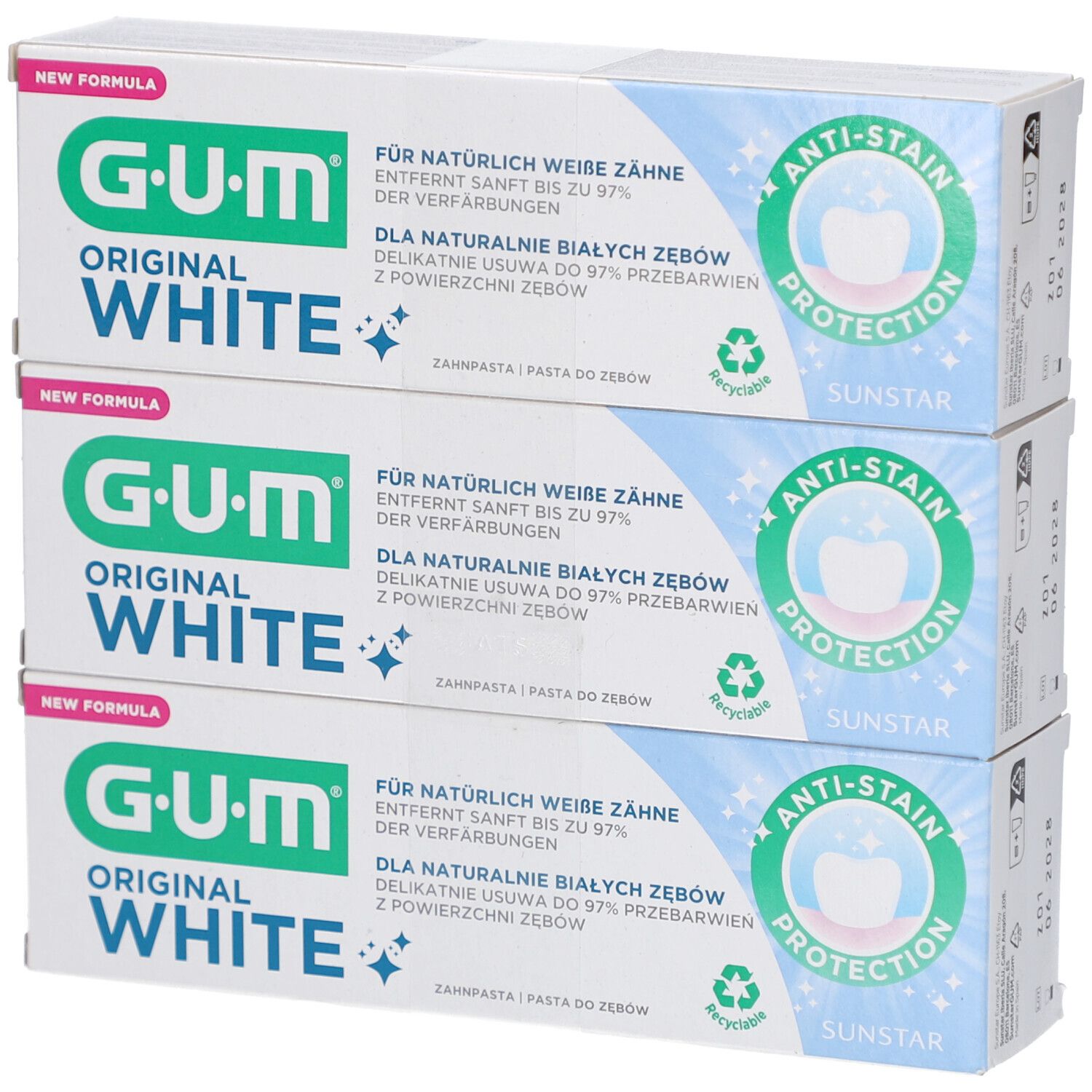 Trois tubes de dentifrice GUM Original White en emballage. Inscription: Protection anti-taches. Symbole de recyclage.