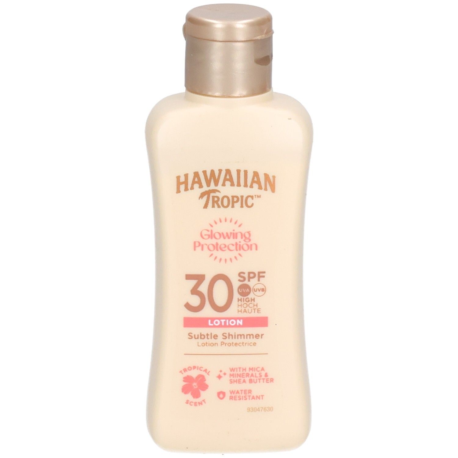 Flacon de lotion beige avec bouchon doré. Inscription: Hawaiian Tropic, Glowing Protection SPF30. Étiquette rose avec texte.