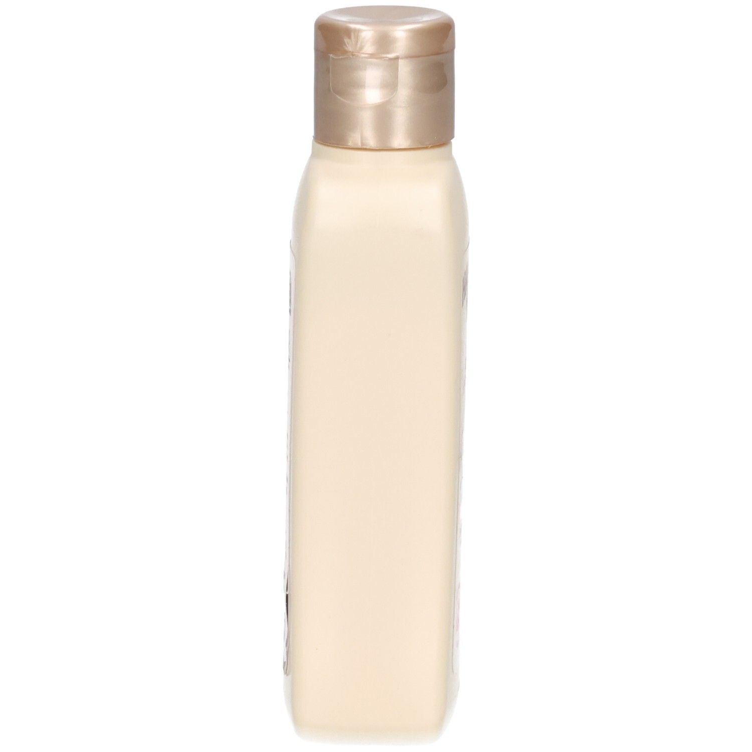 Flacon de lotion beige, vue latérale. Bouchon doré. Forme rectangulaire.