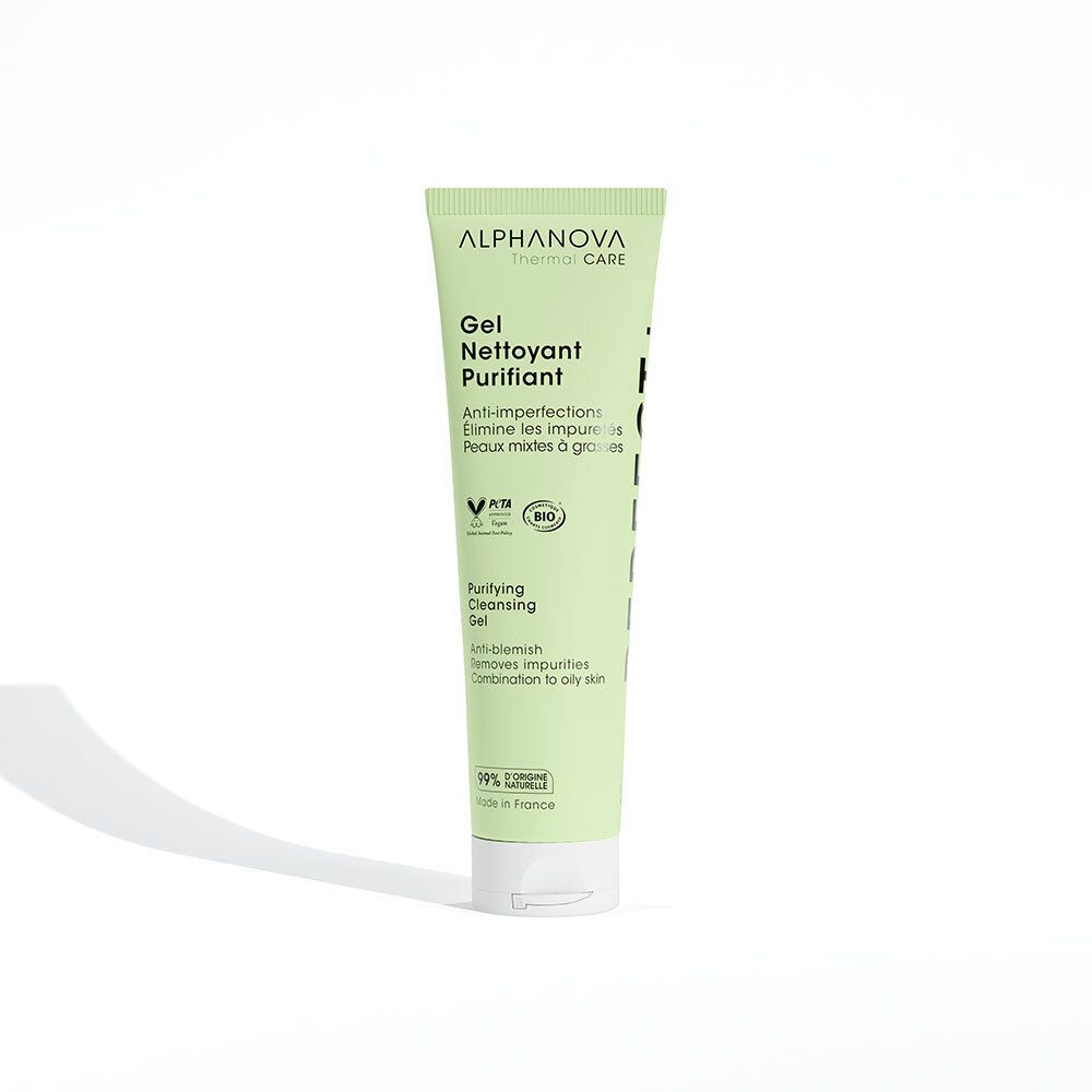 Tube vert avec nom du produit et logo. Texte: Gel Nettoyant Purifiant, Anti-imperfections. Labels vegan et bio.