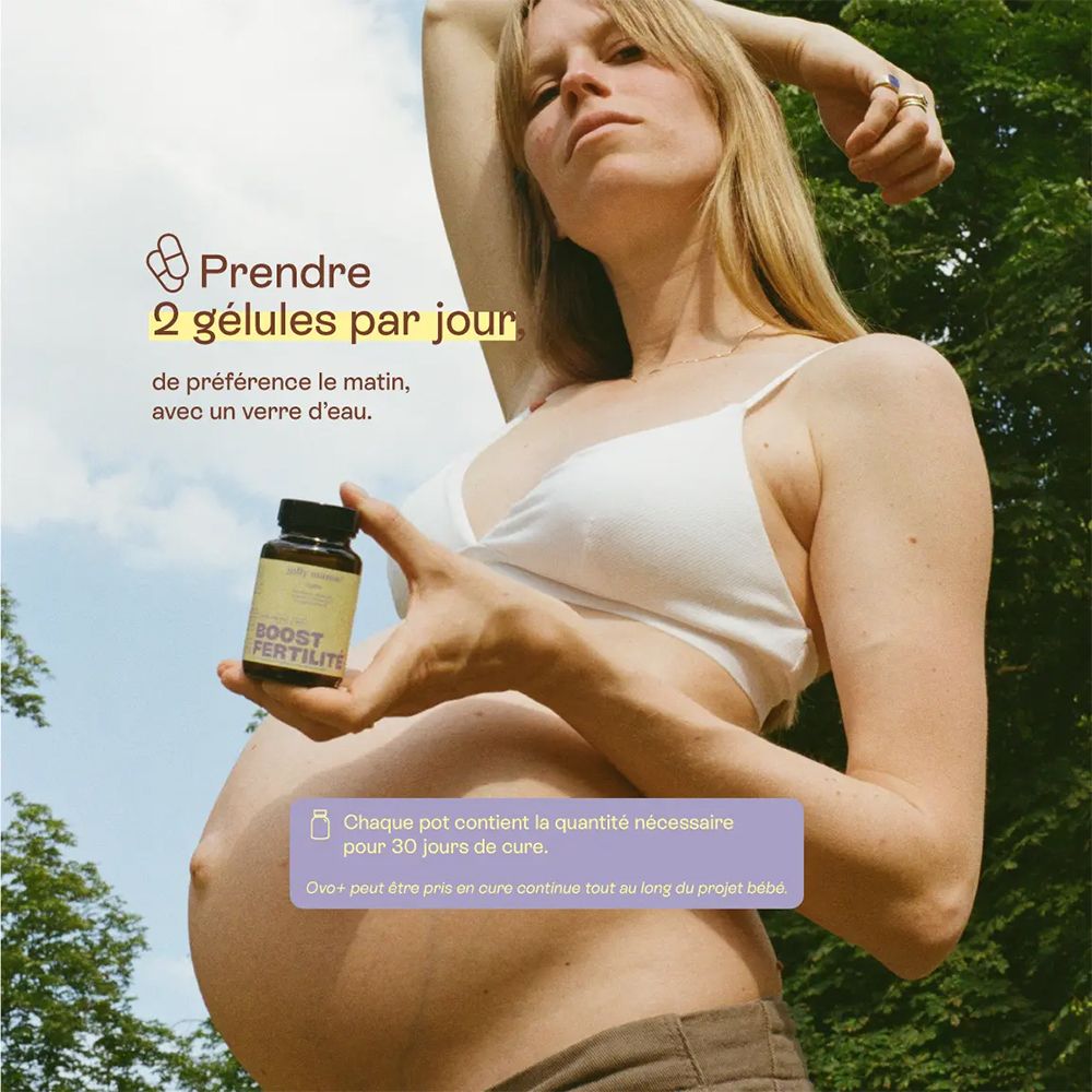 Femme enceinte tenant un flacon. Texte: "Prendre 2 gélules par jour".