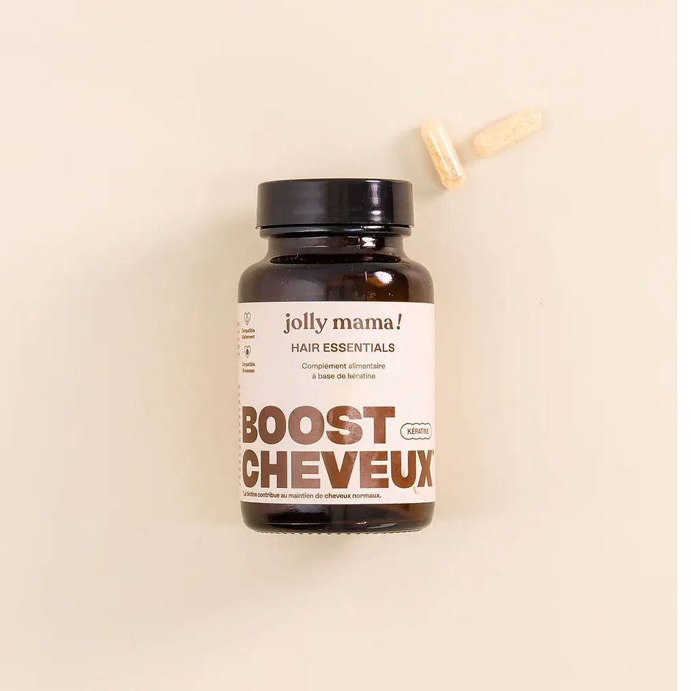 Flacon brun avec gélules. Inscription: Jolly Mama! Hair Essentials. BOOST CHEVEUX.