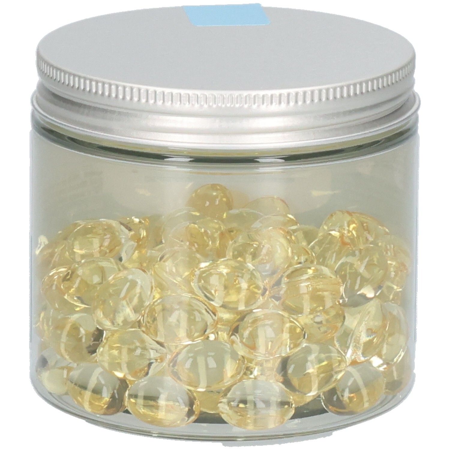Pot en verre avec capsules. Couvercle en métal. Capsules dans le pot.