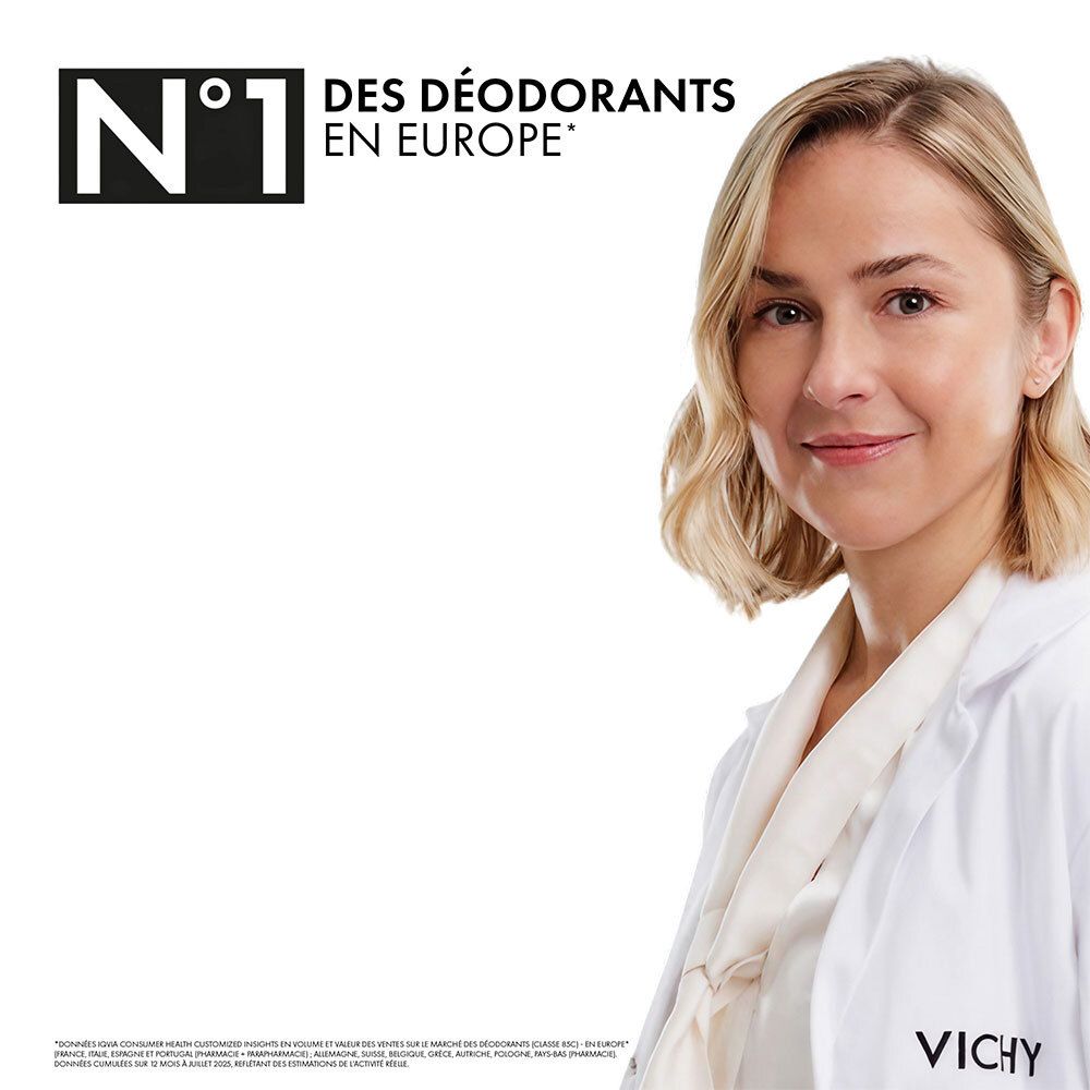 Femme en blouse blanche avec logo Vichy.
