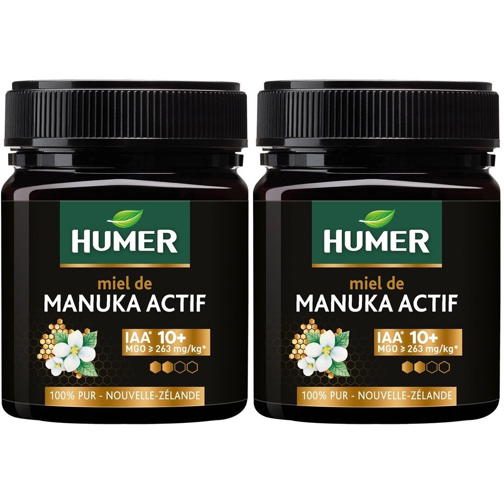 Deux pots avec couvercles noirs. Étiquette avec HUMER, MANUKA ACTIF, IAA 10+. Inscription: 100% PUR - NOUVELLE-ZÉLANDE.