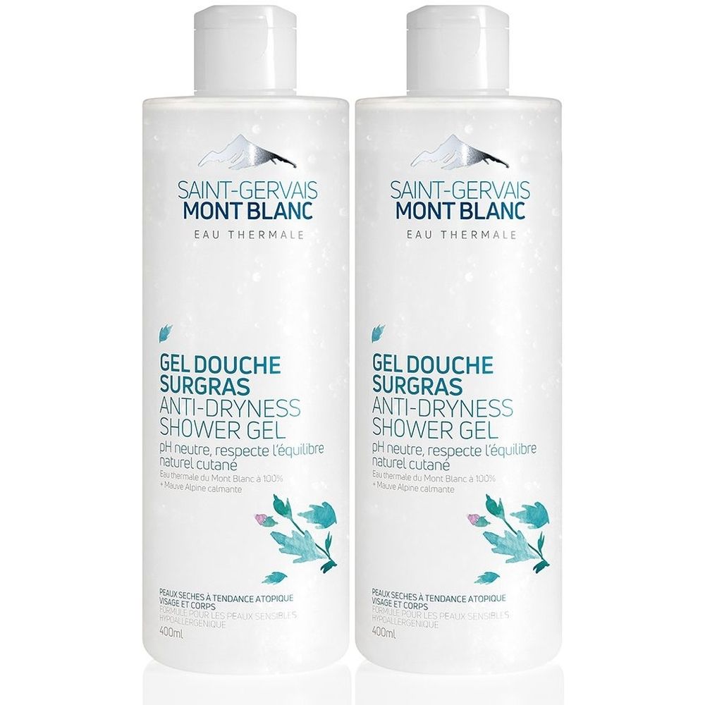 Deux flacons blancs de Gel Douche Surgras SAINT-GERVAIS MONT BLANC. Texte: Anti-Dryness Shower Gel. pH neutre, pour peaux sèches.