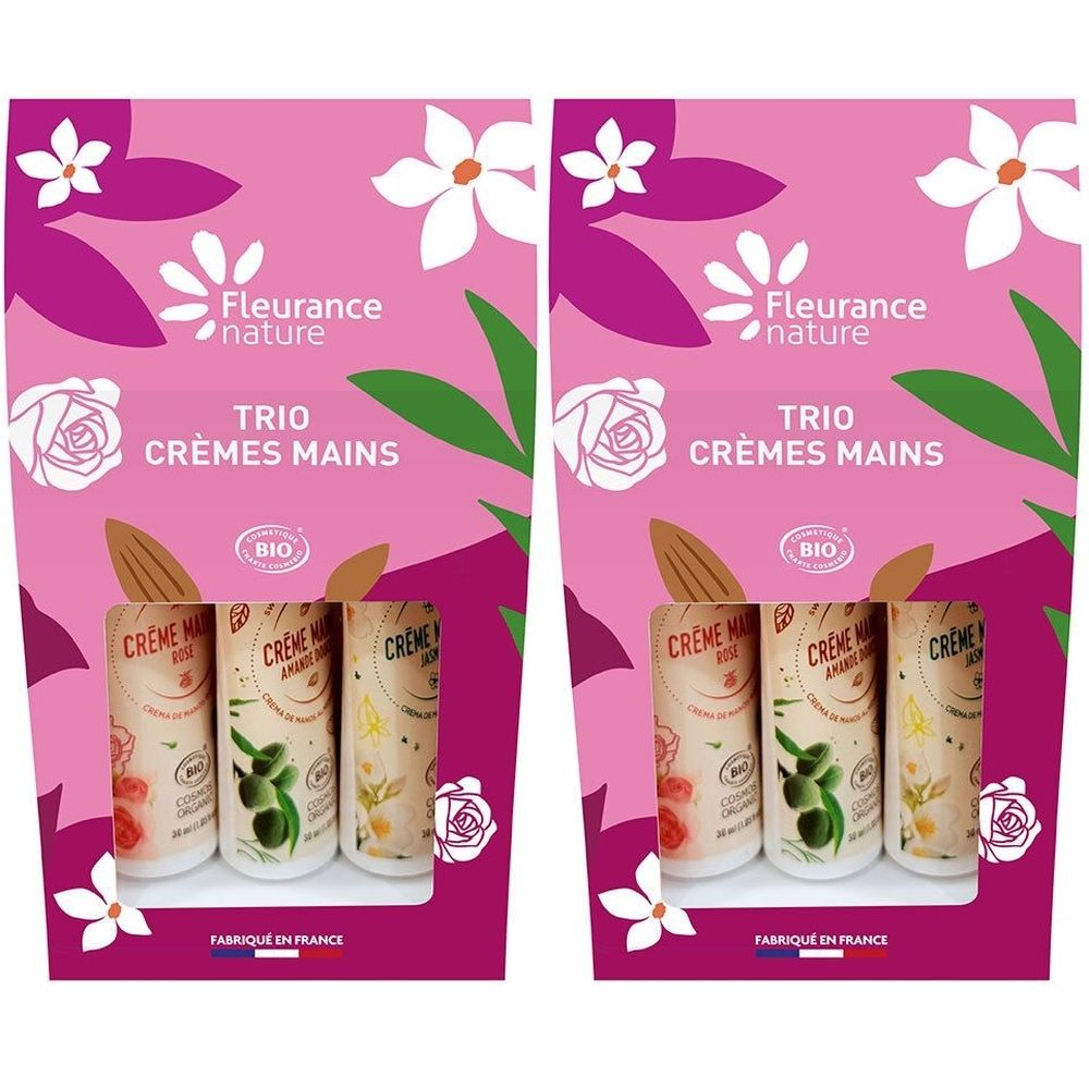 Emballage Trio Crèmes Mains. Fond rose avec fleurs et feuilles. Texte: Fleurance nature, Trio Crèmes Mains, Bio. Fabriqué en France.