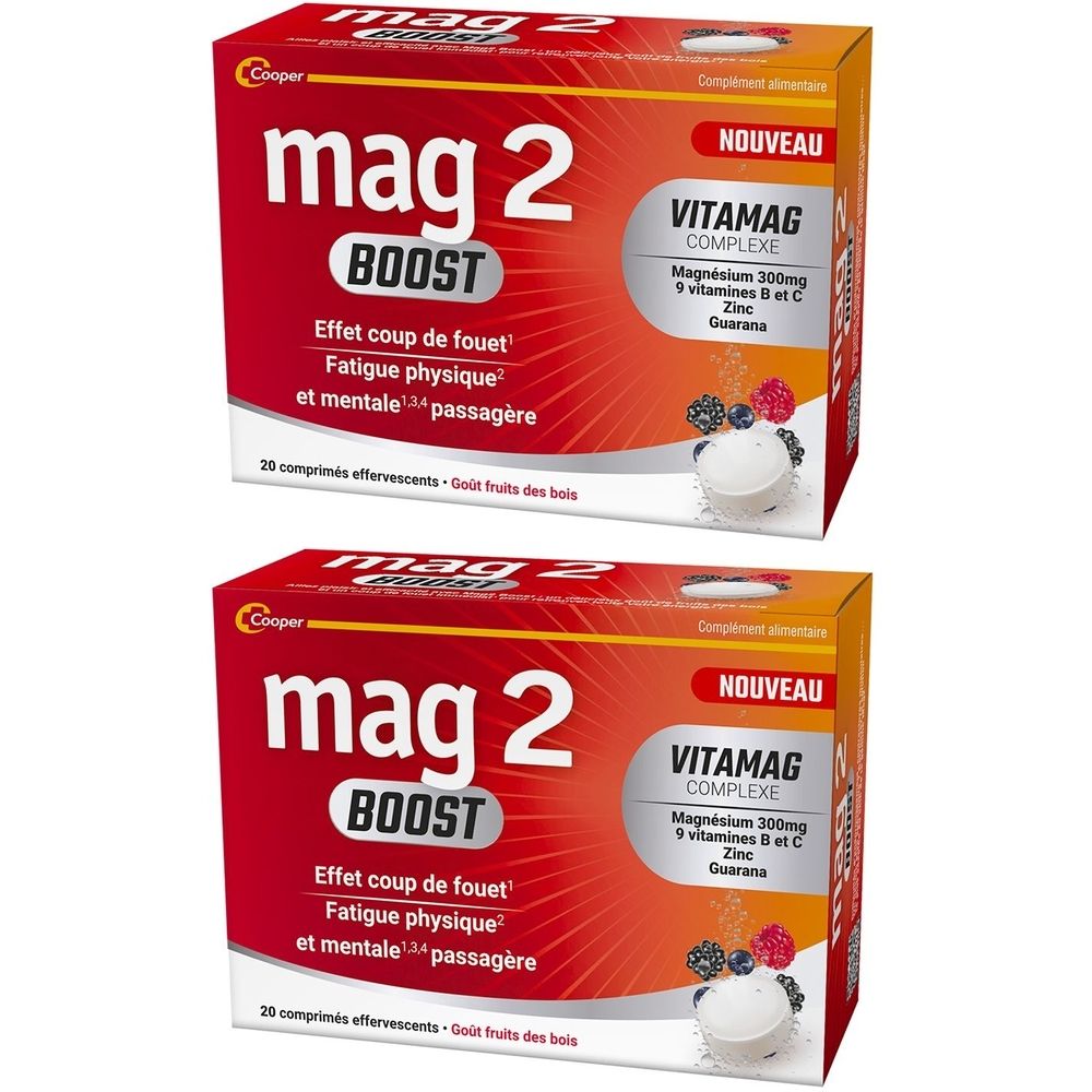 Deux boîtes de MAG 2 BOOST. Emballage rouge avec texte blanc. Contient Vitamag Complex. 20 comprimés effervescents, goût fruits des bois.